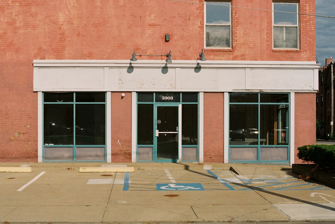An empty parking lot in front of a building